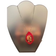 Skull Pendant Necklace Silver Chain Red Bubble Plastic Scrolls - £7.76 GBP