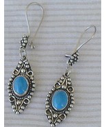 Turquoise dangling earrings - $342.71 MXN