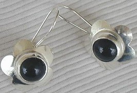 Black flowers earrings - $20.00