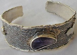 Amethyst  A bangle - £44.87 GBP