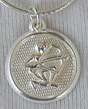 Sagittarius round pendant. - $25.00