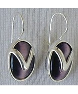 Purple with silver earrings - $456.94 MXN