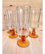 7 Luminarc vintage champagne glasses with amber stem from France - $758.02 MXN