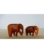 Cute pair of vintage miniature carved wood elephants figurines - $12.00