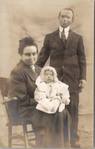 RPPC Family Photo Man Woman Baby Fluffy Hat Real Photo Postcard U19 - £5.22 GBP