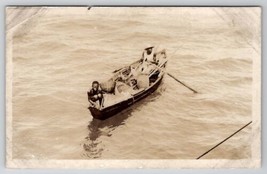 RPPC Small Fishing Boat Fishermen Photo From Larger Vessel Postcard F29 - £14.90 GBP