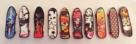 Lot of 10 Mini Skateboards Fingerboards Finger Toys Graphics on Both Sid... - $10.50