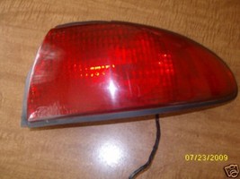 1997 1996 1995 FORD CONTOUR RIGHT TAIL LIGHT OEM USED ORIGINAL FORD PART - $157.41
