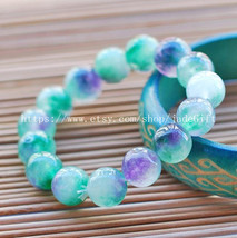 Free shipping - lavender green floating flower jade beaded bracelet pray... - $25.99