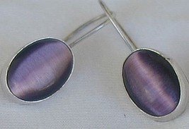 Purple cat eye C - $20.00