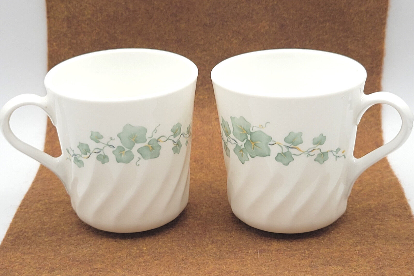 Primary image for 2 Coffee Mug Cup Corning Callaway Green Ivy Swirl Milk White Glass