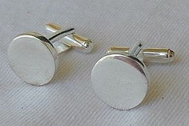  silver round cufflinks  - $795.89 MXN