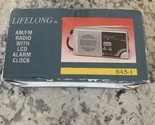LifeLong AM/FM radio with LCD alarm clock - $9.59