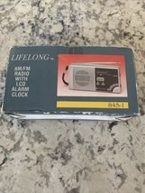 LifeLong AM/FM radio with LCD alarm clock - $9.59