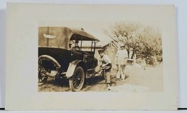 RPPC Young Boy Posing with Early Automobile c1910 Postcard L4 - £10.31 GBP