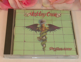 CD Motley Crue Dr. Feelgood Gently Used CD 11 Tracks EMI Records - £8.59 GBP