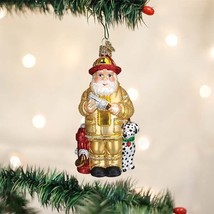 Old World Christmas Yellow Coat Fireman Santa Glass Christmas Ornament 40326 - $22.88