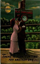 1912 Theochrom Postcard Romance Plenty Of Time Kissing on Train Platform - $16.02