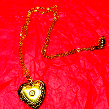 Gorgeous vintage heart locket necklace with one rhinestone in the middle - $28.71