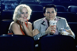 Patricia Arquette and Christian Slater in True Romance eating popcorn in... - $23.99