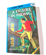 A figure in hiding Hardy boys Franklin Dixon book hardcover fiction - $6.60 CAD