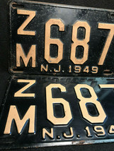 Vtg Metal ZM687 NJ &#39;49 Automobile/Automotive License Plates Black/White Set - £79.20 GBP