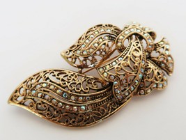 Vintage gold tone scrollwork ribbon brooch with AB rhinestone accents - £11.84 GBP