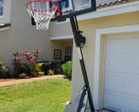 Spalding 54&quot; Portable Basketball System Adjustable Hoop Backboard Angled... - $314.99