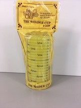 The Pampered Chef Wonder Cup #2220 Adjustable Measuring Liquids Dry Solid Yellow - £11.65 GBP