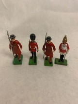Lot of 4 Britains LTD England Red Metal Small Soldier Guards TOY figurin... - $24.74