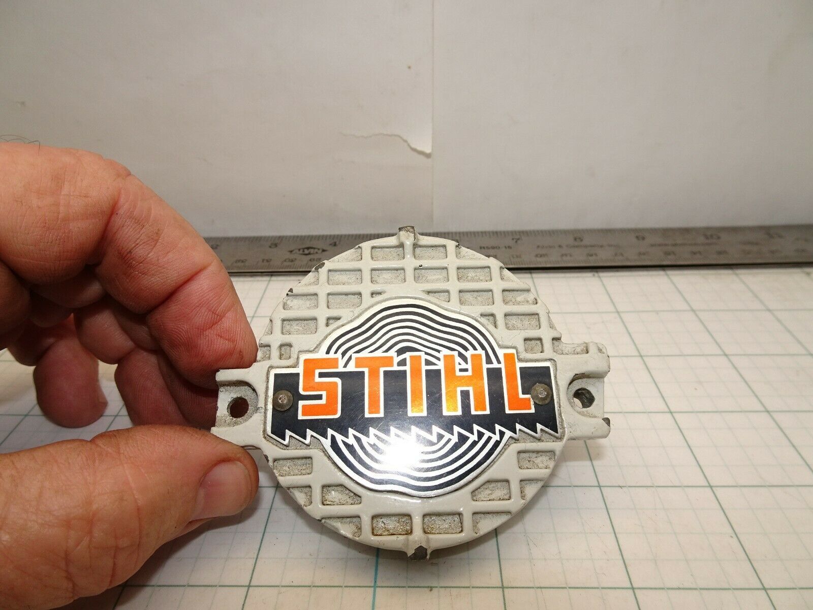 Primary image for Stihl 1114 195 0500 Recoil Starter Center Cover Early Style Logo OEM NOS