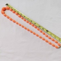 Vintage Graduated Swirl Grooved Oval Lucite Bead Peach Necklace 31&quot; long. - £14.01 GBP