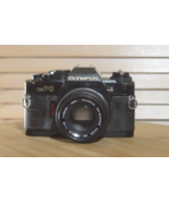 Rare Black Olympus OMPC SLR with Zuiko 50mm f1.8 lens. In Fantastic condition. - $180.00
