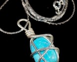 Wire wrapped natural turquoise silver24 close thumb155 crop