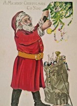 Santa Claus Christmas Postcard Decorating Tree Sack Of Toys Full Figure Embossed - £21.36 GBP