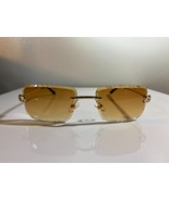 Unisex, rimless, gem cut sunglasses with brown lenses and gold wire frame. - $10.00