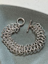 Unique Silvertone Infinity Loop Link Bracelet – 7 inches long x 0.5 inch... - £10.22 GBP