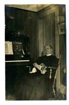 Woman in Rocking Chair In Front of Piano with Sheet Music Real Photo Postcard - £16.79 GBP