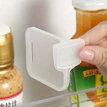 Organize Your Fridge with 4Piece Compartment Organizer Rack - $14.95