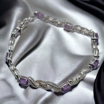 Silver tone fake amethyst bracelet - $276.56 MXN