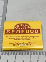 Front Strike Matchbook Cover  Conchy Joe’s Seafood  Jensen Beach FL  gmg - £9.66 GBP