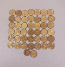 Lot Of 44 No Cash Value Brass Eagle Shield Stars Tokens Coins Gaming Arcade - $28.01