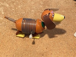 Wind Up Toy Story Slinky Dog *Pre Owned/Wear In Ears* DTB - $9.99