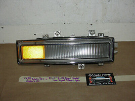 76 Cadillac Eldorado LEFT FRONT FENDER TURN SIGNAL PARK CORNERING LIGHT ... - $173.24