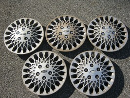 1985 to 1990 Chevy Celebrity 14 inch mag style hubcaps wheel covers blemished - $27.70