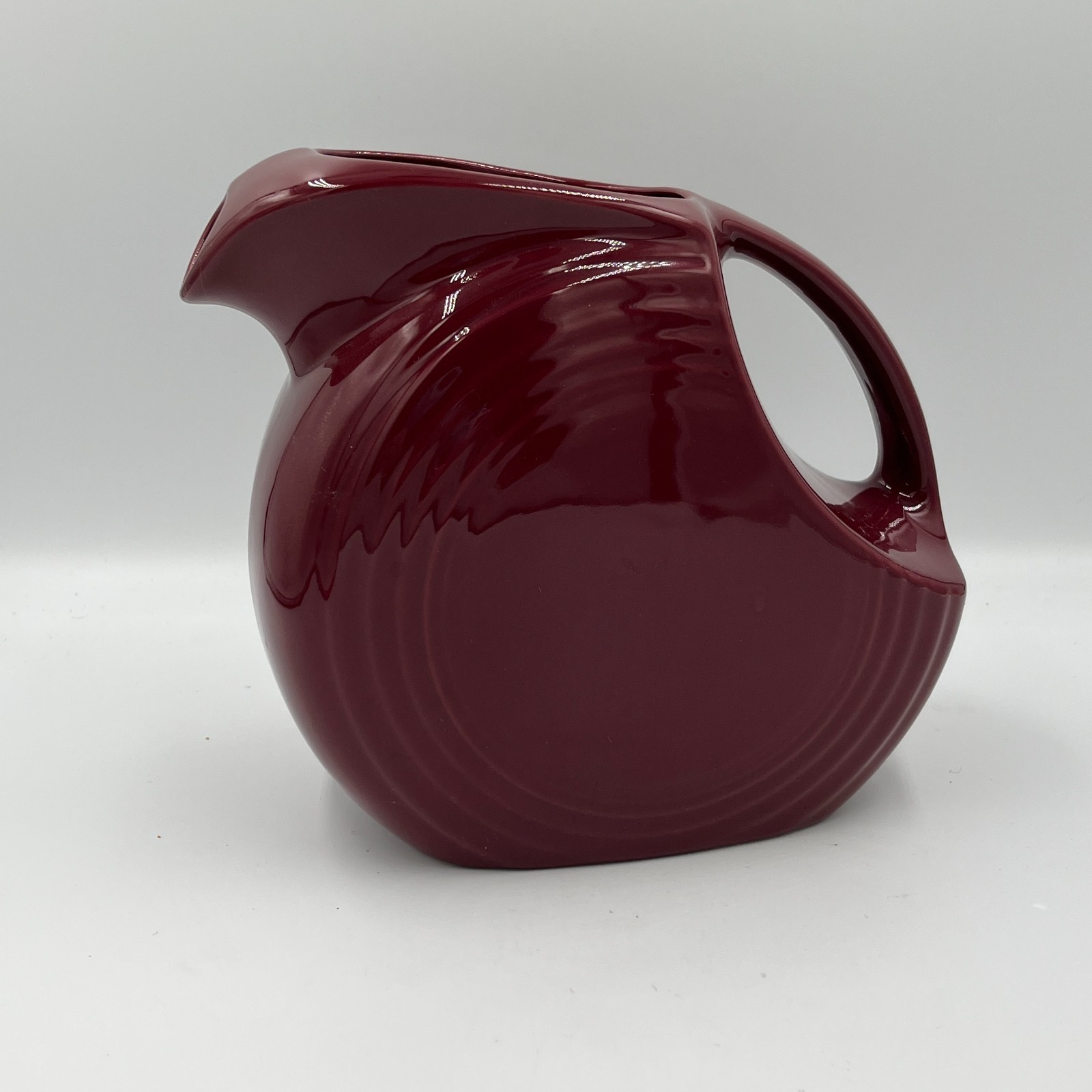Fiesta Homer Laughlin Fiesta Ware Cinnabar Burgundy Lrg 7&quot; Disc Pitcher ... - $29.99