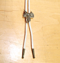 Vintage Saddle Bolo Tie Bronze Brass Tips Off White Fabric Rope Slider W... - £15.08 GBP