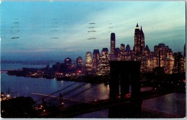 Nighfall Lower Manhattan w Brooklyn Bridge Postcard New York Postmarked 1958 - £7.85 GBP