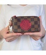 Louis Vuitton Trunks Mini wallet - $449.00