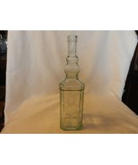 Vintage Clear Glass Bottle With Embossed Designs 11.75&quot; Tall - $47.50